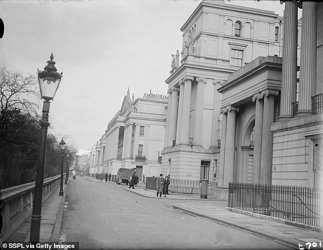 Wallis's breaking point was a brick through the window of his house in Cumberland Terrace, next to Regent's Park.  This photograph was taken on December 3, 1936, the day her impending marriage to the King was made public.