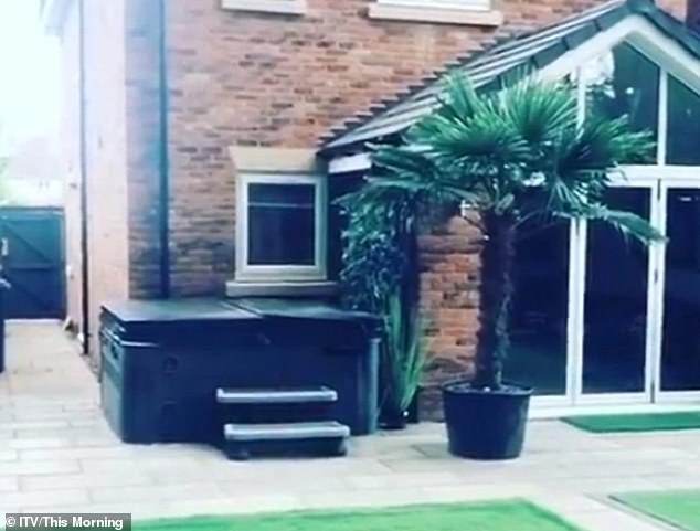 The speaker previously lived in a £700,000 home in Solihull, which boasted a garden hot tub and a large glass conservatory (pictured)