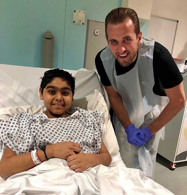 The health service will reach a major milestone in April when the 100,000th patient will receive medicines thanks to the Cancer Medicines Fund.  Yuvan Thakkar (pictured with footballer Harry Kane), from Watford, was the first child in the UK to benefit from a pioneering CAR T therapy called Kymriah, thanks to the Trust.
