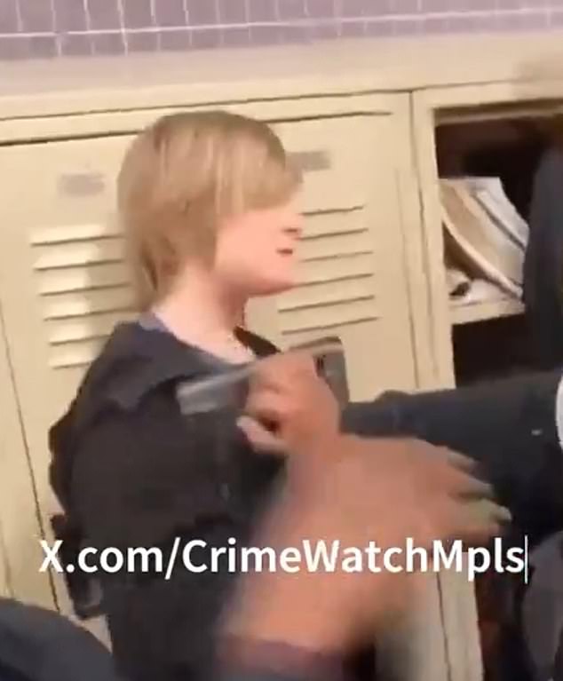 Disturbing video of a group of boys pushing a smaller student against lockers before beating him at a Minneapolis school has surfaced online