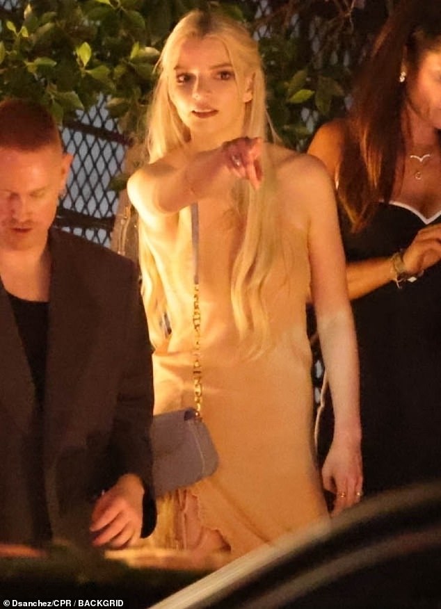 Anya Taylor-Joy, 27, stunned in an asymmetrical gold dress while leaving the CAA pre-Oscars party in West Hollywood on Friday night.