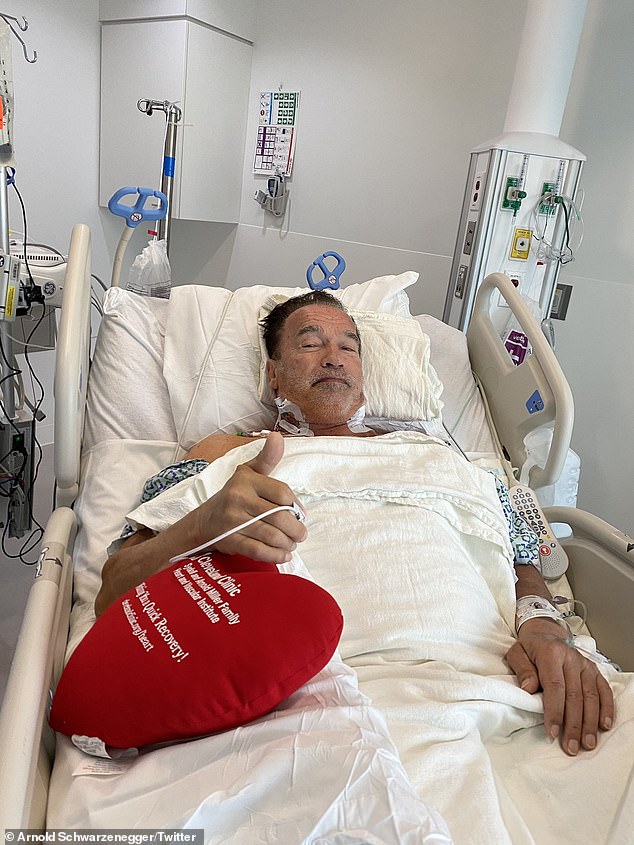 Action man Arnold has undergone three open heart surgeries in the past and shared this image from his hospital bed in 2020.