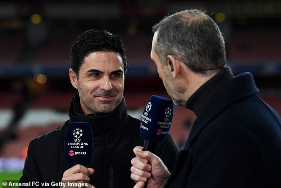 LONDON, ENGLAND - MARCH 12: Mikel Arteta, Arsenal coach, speaks with Martin Keown, former English footballer and current TNT Sports expert, before the 2023/24 UEFA Champions League round of 16 second leg match between Arsenal FC and FC Porto at the Emirates Stadium on March 12, 2024 in London, England. (Photo by David Price/Arsenal FC via Getty Images)