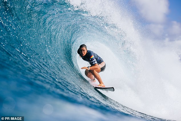 Two-time world surfing champion Tyler Wright (pictured competing at Hawaii Pipeline) will go to the Paris Olympics later this year with seven screws in her head.