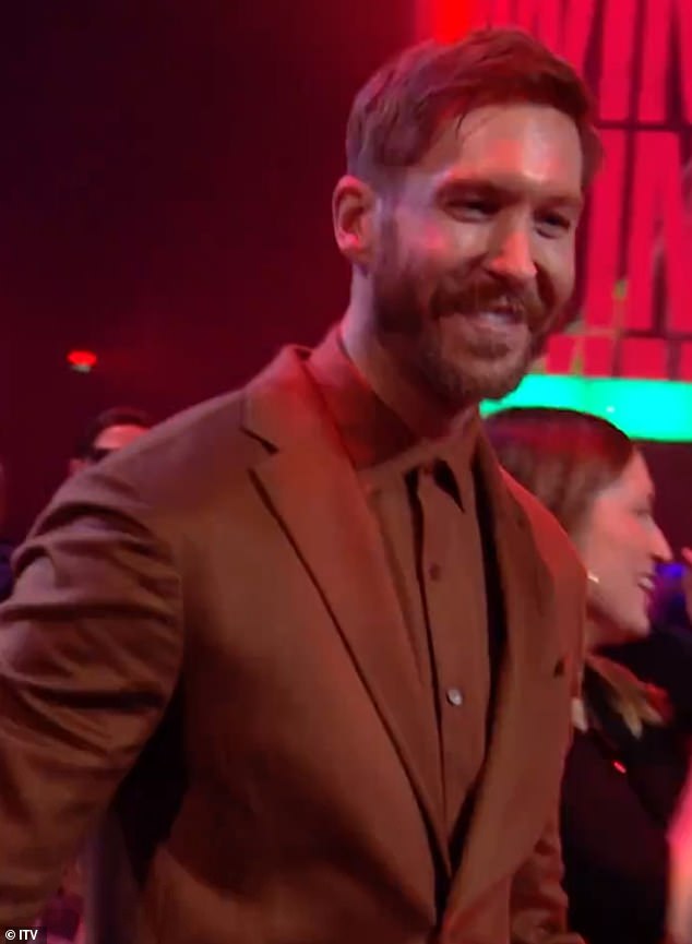 Calvin Harris shared a sweet hug with Vick Hope's parents after winning Best Dance Performance of the Year at the BRIT Awards 2024 on Saturday.
