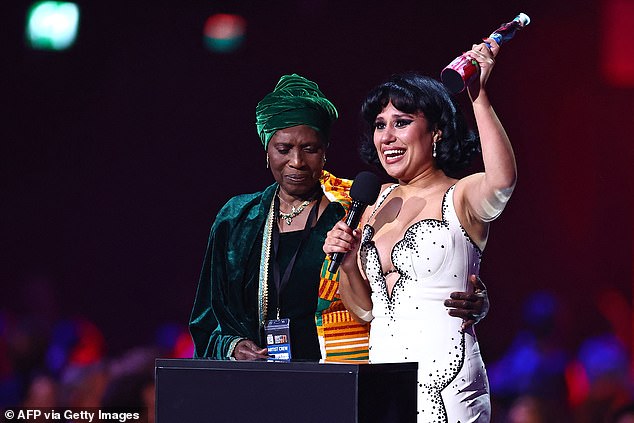 Raye broke records at Saturday night's BRIT Awards, winning six gongs during a star-studded ceremony at London's O2 arena, leaving her in tears as she carried her beloved grandmother on stage.