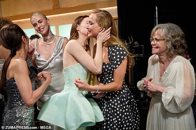 Emma Stone embraced her best friend Jennifer Lawrence as fans got a glimpse backstage at the 2024 Academy Awards on Sunday