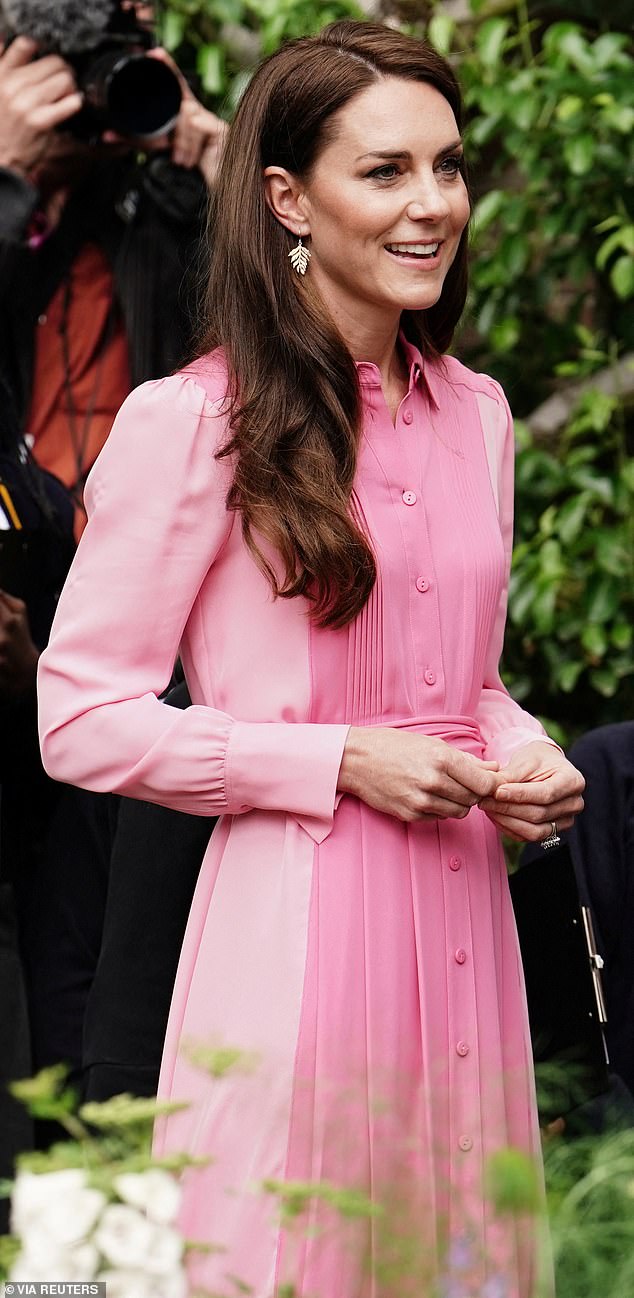 Kate is pictured wearing a vivid pink ME + EM dress at the RHS Chelsea Flower Show last May