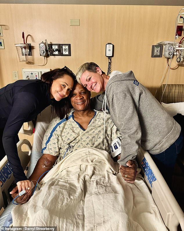 Darryl Strawberry smiles with his family after suffering a heart attack Monday night