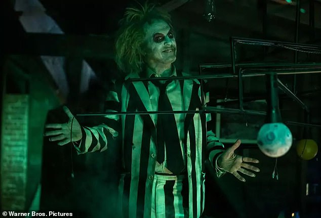 Michael Keaton donned his iconic black and white suit for a first look at Beetlejuice Beetlejuice, the long-awaited sequel to director Tim Burton's 1988 classic.