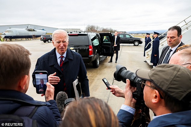 President Joe Biden speaks to reporters on his way back to the White House from Camp David, where he was working on his State of the Union address.