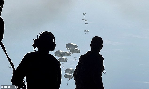 Members of the Jordanian Armed Forces airdrop aid packages along the Gaza coast, in cooperation with Egypt, Qatar, France and the United Arab Emirates;  The United States will join the airdrops in the coming days, President Biden announced.