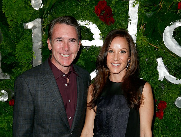 Chief Financial Officer Brian West, seen here with his wife Sheri West, told a Bank of America conference that the company would spend between $4 billion and $4.5 billion.