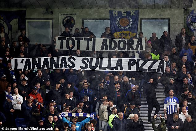 Brighton fans took revenge on Roma ultras with a humorous poster about pineapple pizza