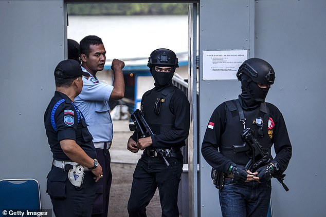 Prisoners are usually executed by firing squad.  Pictured: Indonesian police at Nusakambangan prison as Indonesia prepares for drug-related executions in July 2016.
