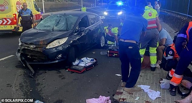 Shocking images from the scene showed police and paramedics desperately working on stricken pedestrians on the side of the road while a wrecked Ford Fiesta lay with what appeared to be blood stains on the bonnet.