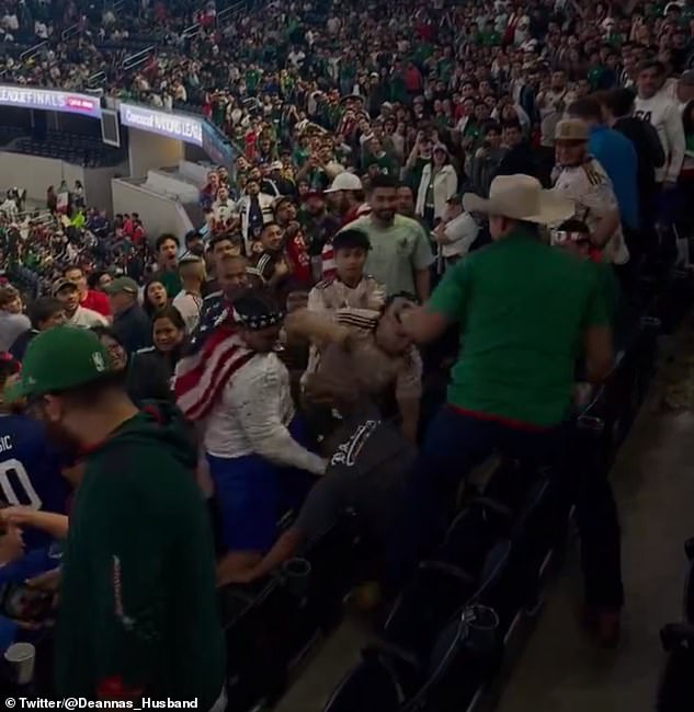 A brutal fight broke out in the stands of AT&T Stadium between fans from the United States and Mexico