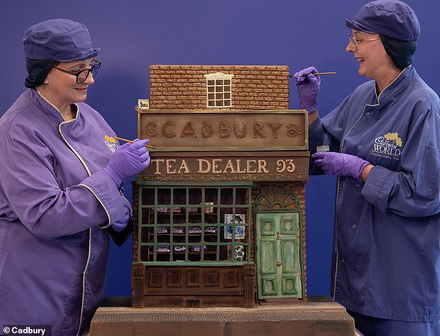 Pictured: Cadbury chocolatiers Donna Oluban and Dawn Jenks perfect their recreation of the first store.