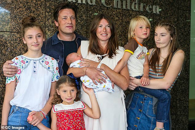 Jools Oliver, 49 (third from right) has given birth to five children over the past two decades and is now training to become a midwife.