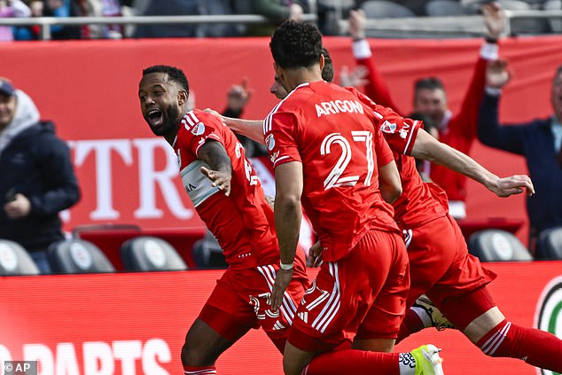 Kellyn Acosta delivered a wind-aided, tying goal from midfield in the final moments