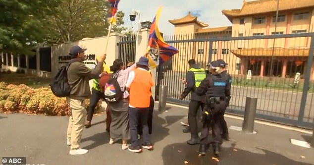 A crowd of activists gathered outside the Chinese Embassy in Canberra on Wednesday afternoon to accuse China of human rights abuses in Hong Kong, Tibet and Xinjiang.