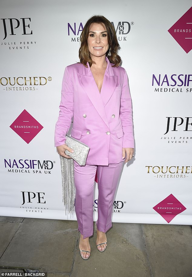 Coleen Rooney surely showed off her style chops as she marked International Women's Day in Manchester at an event hosted by businesswoman Julie Perry, at Harvey Nichols in Manchester.
