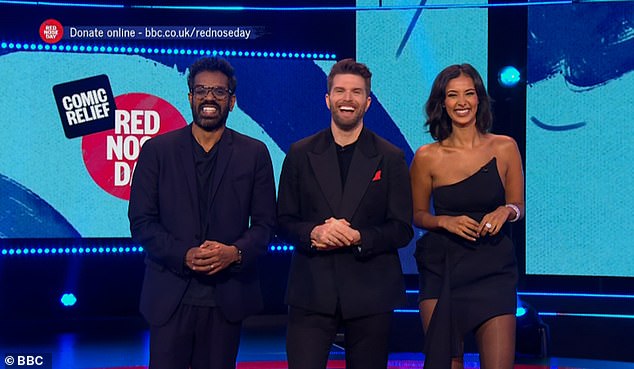 Fresh from the first ever Love Island All Stars, the star paired the short outfit with sheer tights and black heels (pictured with Joel Dommett and Romesh Ranganathan)