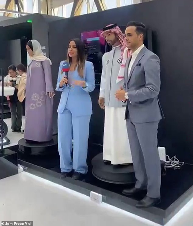Journalist Rawya Kassem spoke live at an artificial intelligence event in Saudi Arabia while standing next to the robot Muhammed.