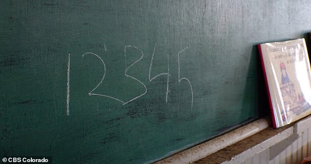The blackboards had faint writing that was decades old.