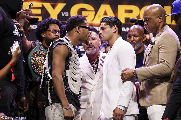 Devin Haney accused Ryan Garcia's father, Henry, of making a racist comment when the press conference for their long-awaited super lightweight showdown turned ugly.