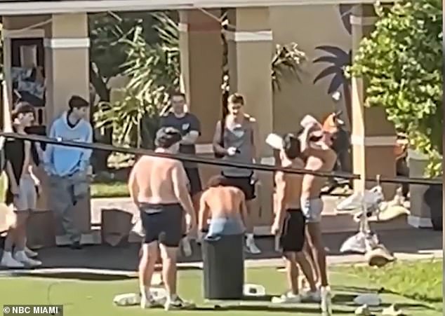 Disturbing video captured a hazing incident at the University of Miami in which members of a fraternity drank milk before spitting it on the naked back of a student sitting on a trash can.