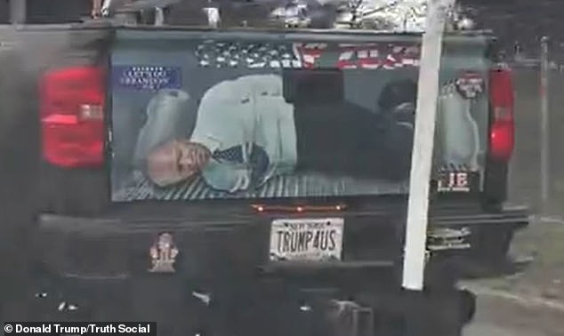 Former President Donald Trump posted a video on social media containing an image of a President Joe Biden tied to a pig painted on the tailgate of a passing truck.