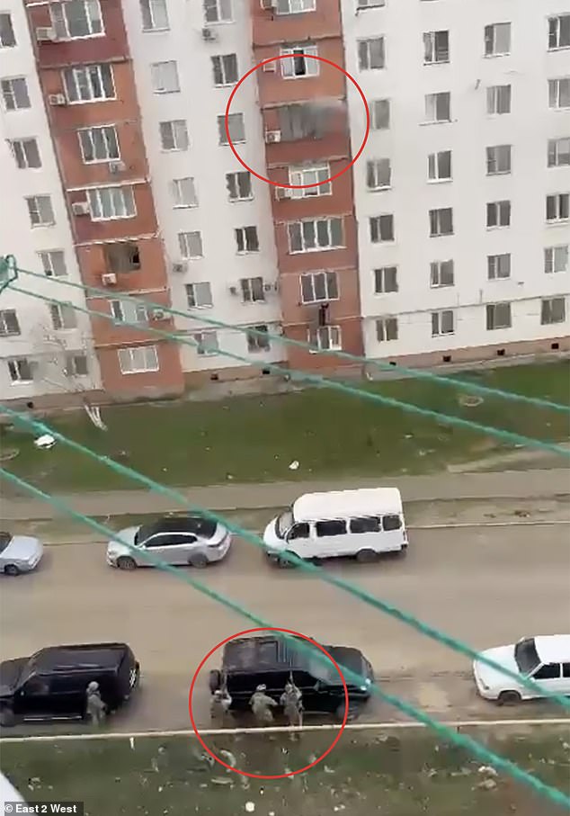 Smoke was seen coming from an apartment in the city of Kaspiysk before the suspects were detained.
