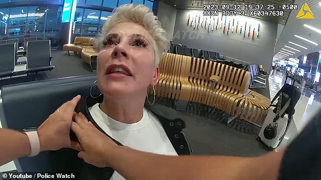 A drunk passenger who was banned from a flight for abusing staff mocked police at penis size and screamed as she was lifted away