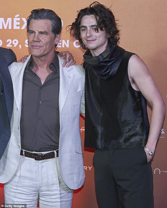 Dune: Part Two Heartthrob Josh Brolin (left), 56, has responded to online rumors that he wants to sleep with his co-star Timothee Chalamet (right), 28.