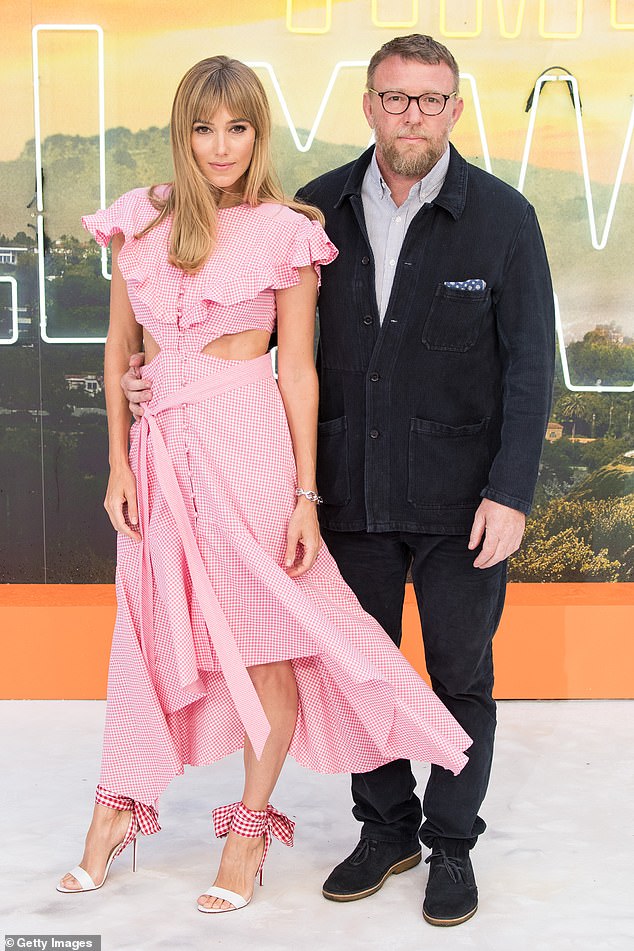 Guy Ritchie and his wife Jacqui Ainsley attend the Once Upon a Time... in Hollywood UK Premiere at Odeon Luxe Leicester Square on July 30, 2019 in London