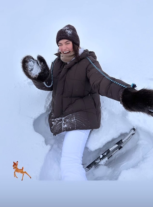 Lily James 34, shared this photo of her frolicking in the snow during a trip to Yellowknife in Canada