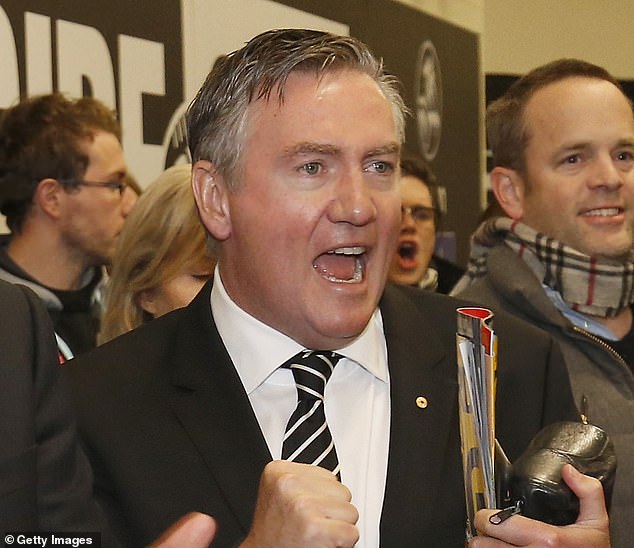 McGuire (pictured clapping in the Collingwood dressing room after a match) wants huge changes to be made to the MCG so it keeps pace with the most modern stadiums on the planet.