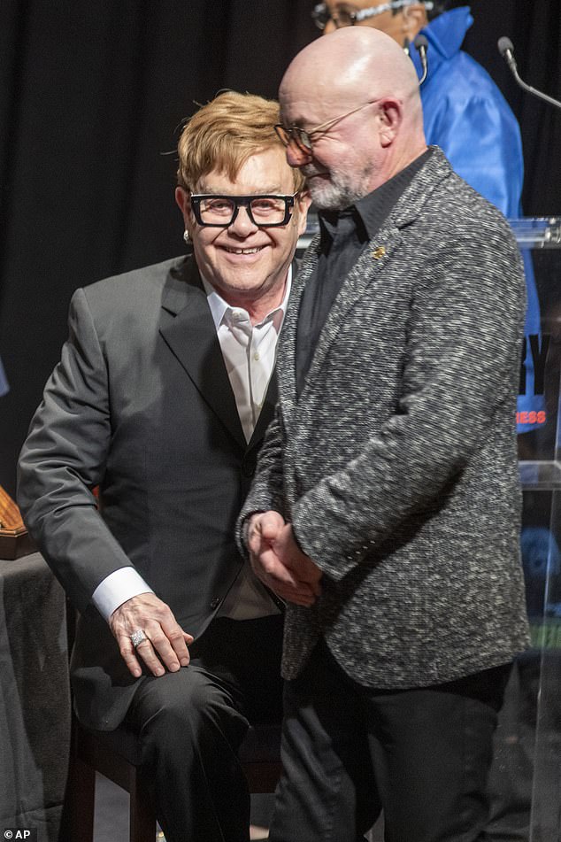 Elton John and his partner Bernie Taupin received the Library of Congress's 2024 Gershwin Prize for Popular Song in Washington DC on Tuesday.