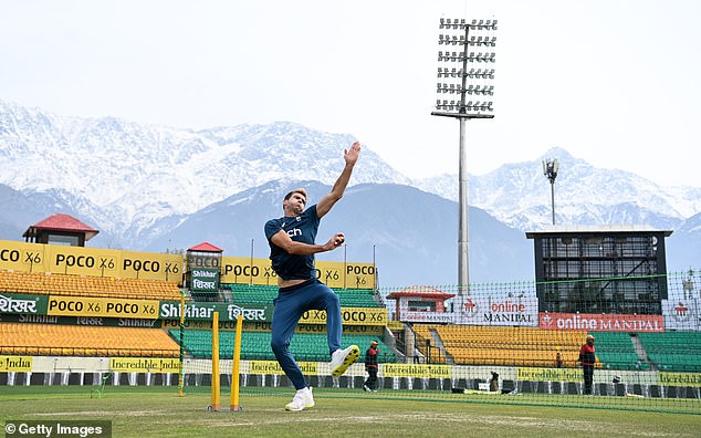 English bowler Jimmy Anderson trains in front of a stunning Himalayan backdrop