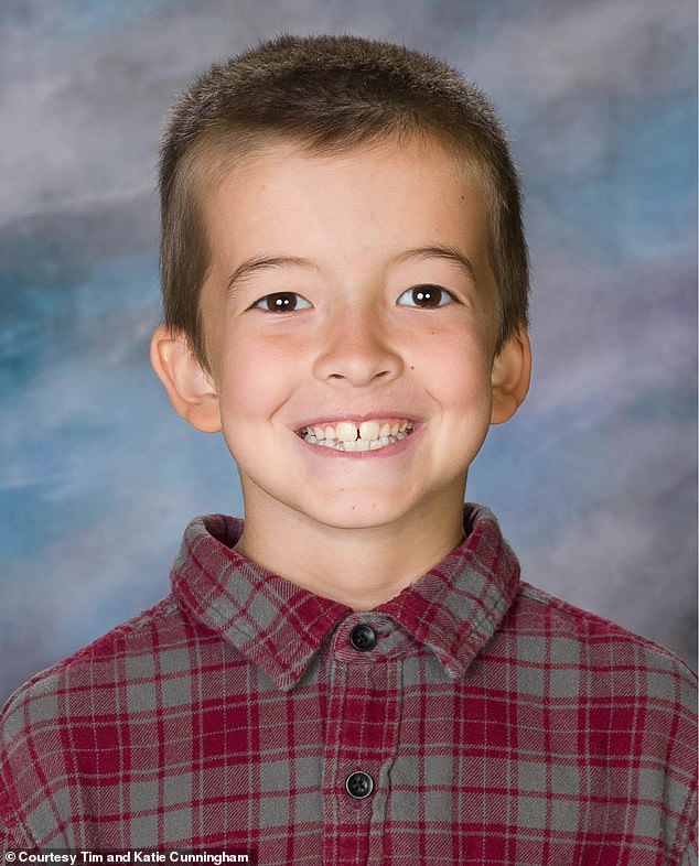 Dallin Cunningham, 8, died after falling from a corkscrew slide in the playground of his elementary school.