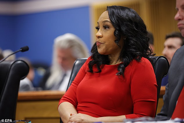 A new filing by Donald Trump's lawyers accuses the Fulton district attorney of playing the 'race card' when he said the allegations against him were politically motivated and targeted his ex-boyfriend, special prosecutor Nathan Wade, because to his race.