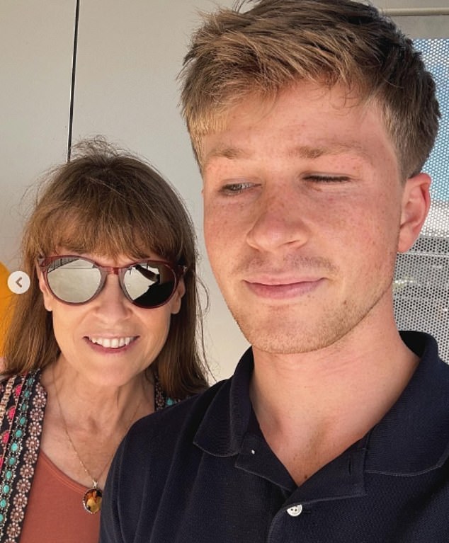 Terri Irwin has left fans 'in tears' after seeing a moving detail in her necklace.  The 59-year-old posed for a photo with her son, Robert Irwin, 20, as they each tried on sunglasses.  Both pictured