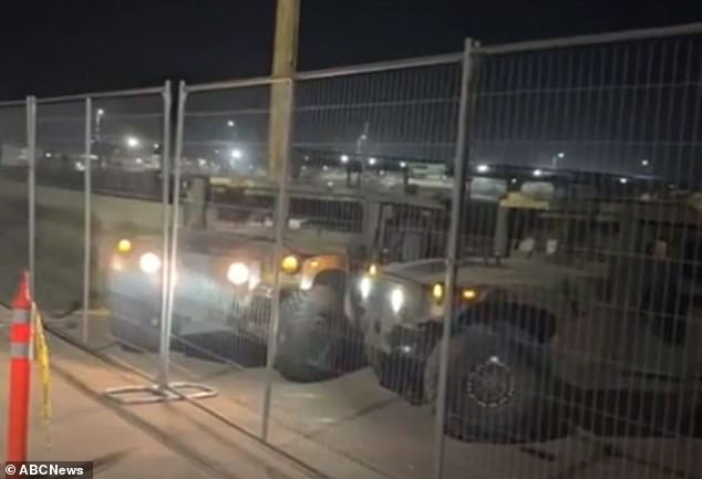Show of force: Texas National Guard vehicles have now blocked the Shelby Park flashpoint from federal agents, reducing their view of the sector border to a 'narrow sliver'