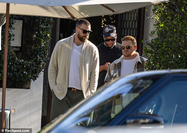 Travis Kelce leaves Cecconi's in LA with friends after lunch on Monday