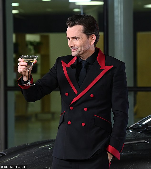 Finally the new 'Bond' is revealed!  Former Dr Who star David Tennant looked dapper and sipped a martini as the actor transforms into the 007 spy for Comic Relief sketch on Friday