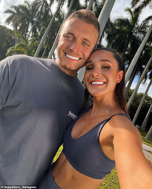 Kayla Itsines' husband, 32, (right), Jae Woodroffe (left), shared a crude photo of his millionaire partner on Sunday as she was caught in a compromising pose.