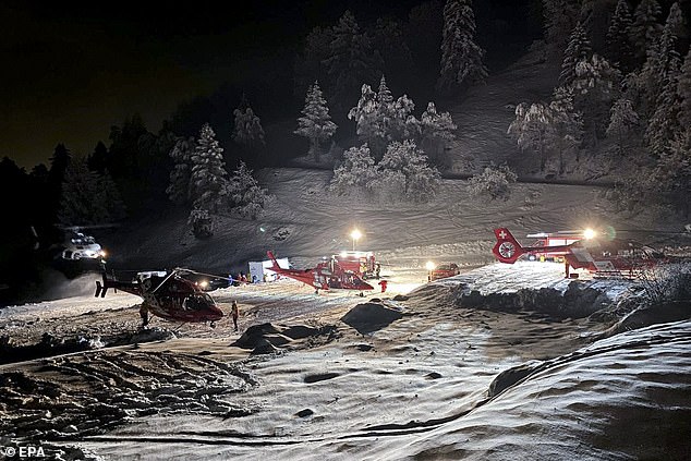 A handout photo provided by the Valais Cantonal Police shows mountain rescuers and helicopters preparing to fly to the Tete Blanche mountain in the Swiss Alps, near Sion, Switzerland, March 10, 2024