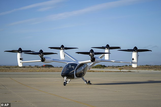 Ministers will outline ambitious plans to overhaul current regulations and infrastructure and allow flying taxis to take flight in 2028 and operate unmanned by 2030 (File image)
