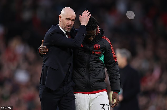 Erik ten Hag and Kobbie Mainoo (right) share a hug after United's 4-3 win over Liverpool in the FA Cup quarter-final on Sunday.